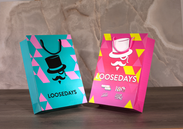 Pair of Gloss Laminated Printed Luxury Bags