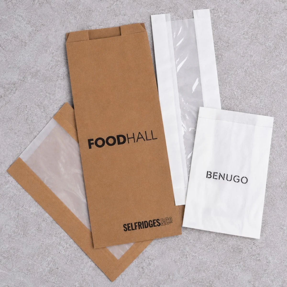 Brown And White Printed Paper Counter Bags Including Selfridges And Benugo Designs