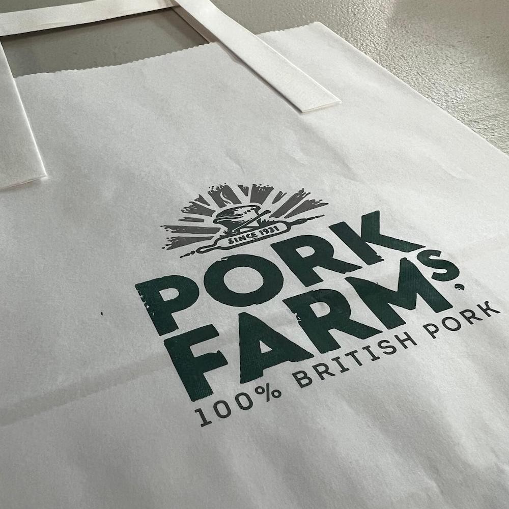 Close up of White Kraft Flat Handle Bag